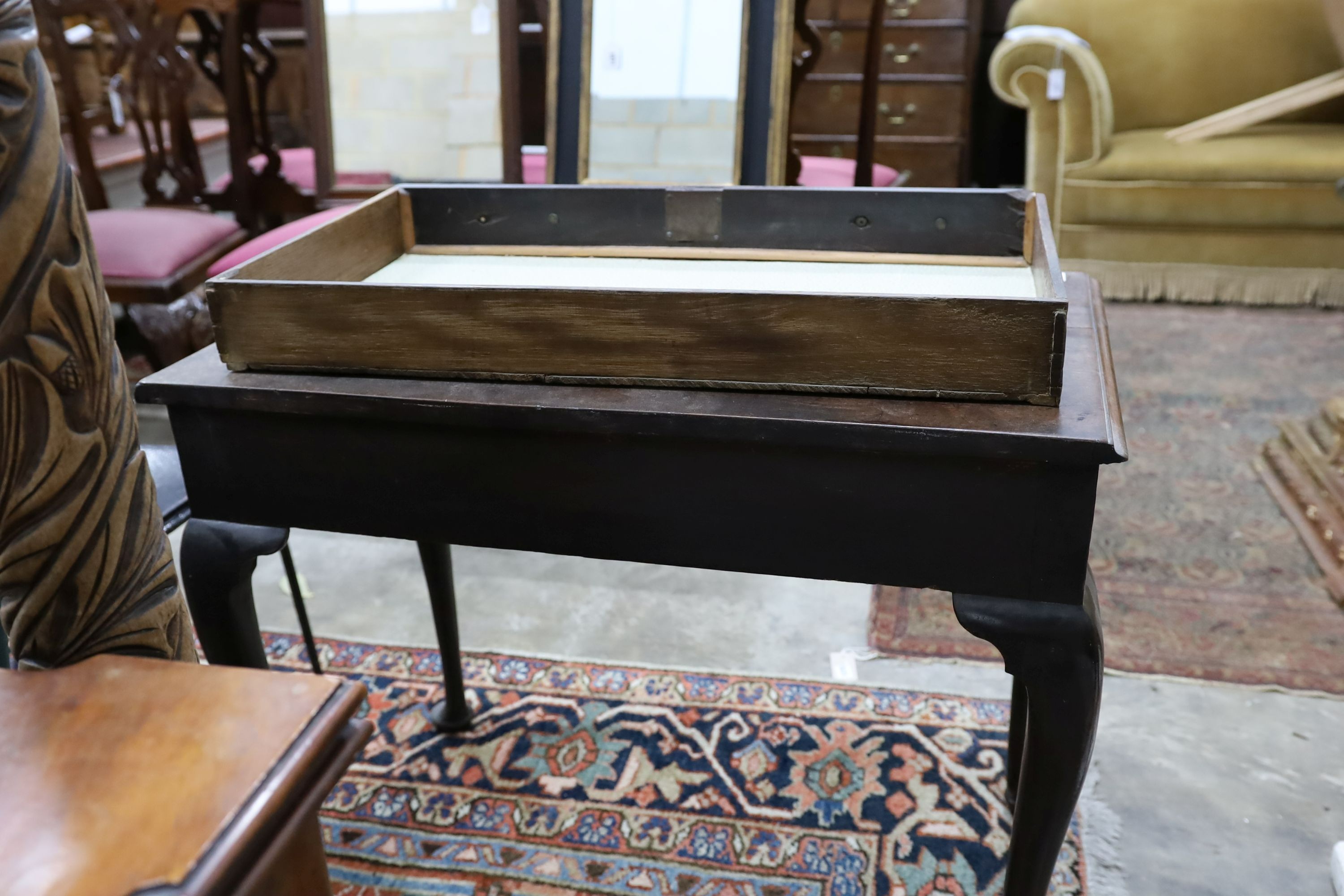 A George III mahogany side table, fitted with a single drawer, on cabriole legs, width 83cm, depth 48cm, height 67cm